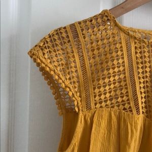 Yellow H&M trapeze blouse with crocheted neckline